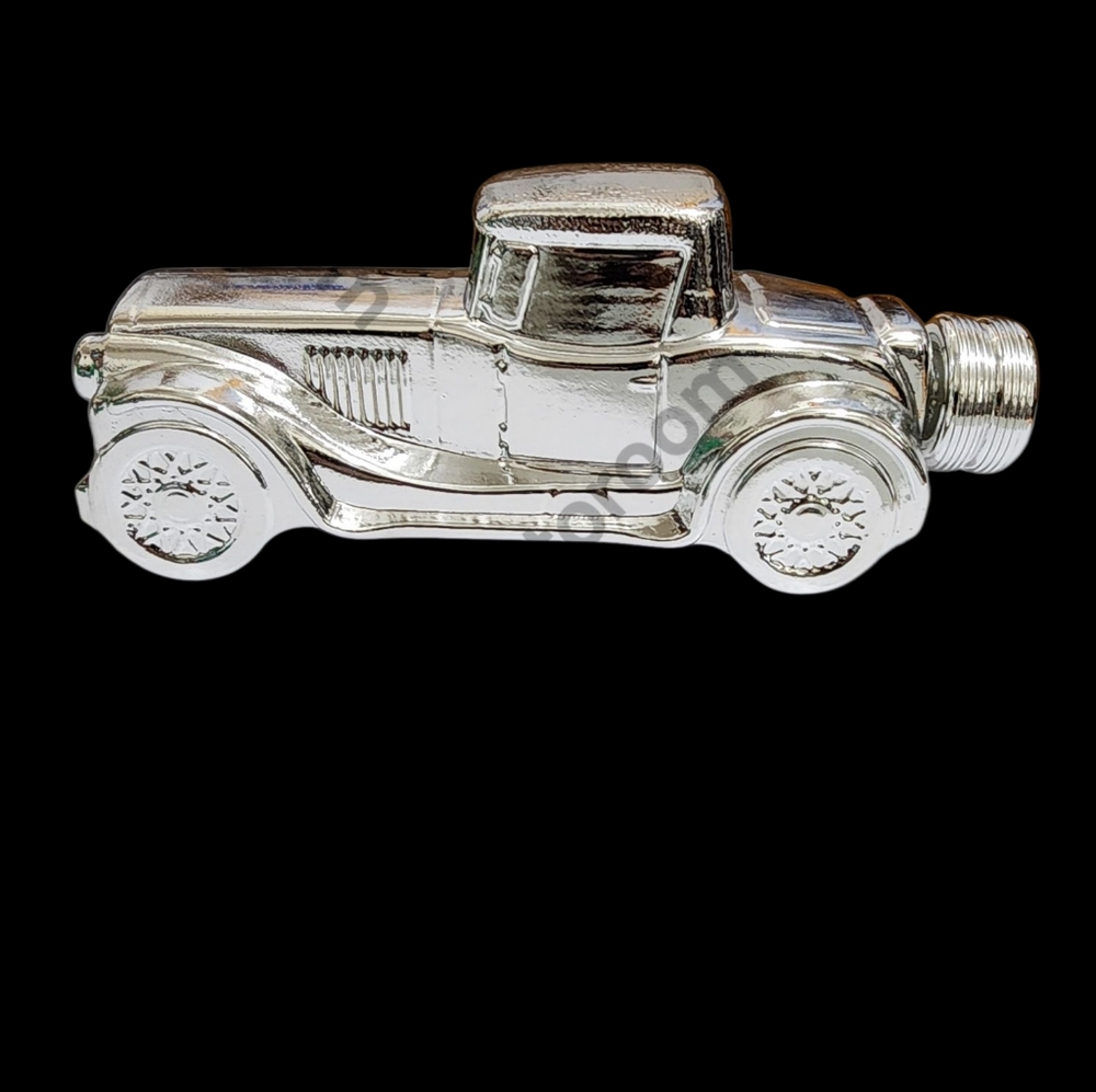 Vintage Avon 1978
 "Antique Sterling Six" after shave car decanter Deep Woods